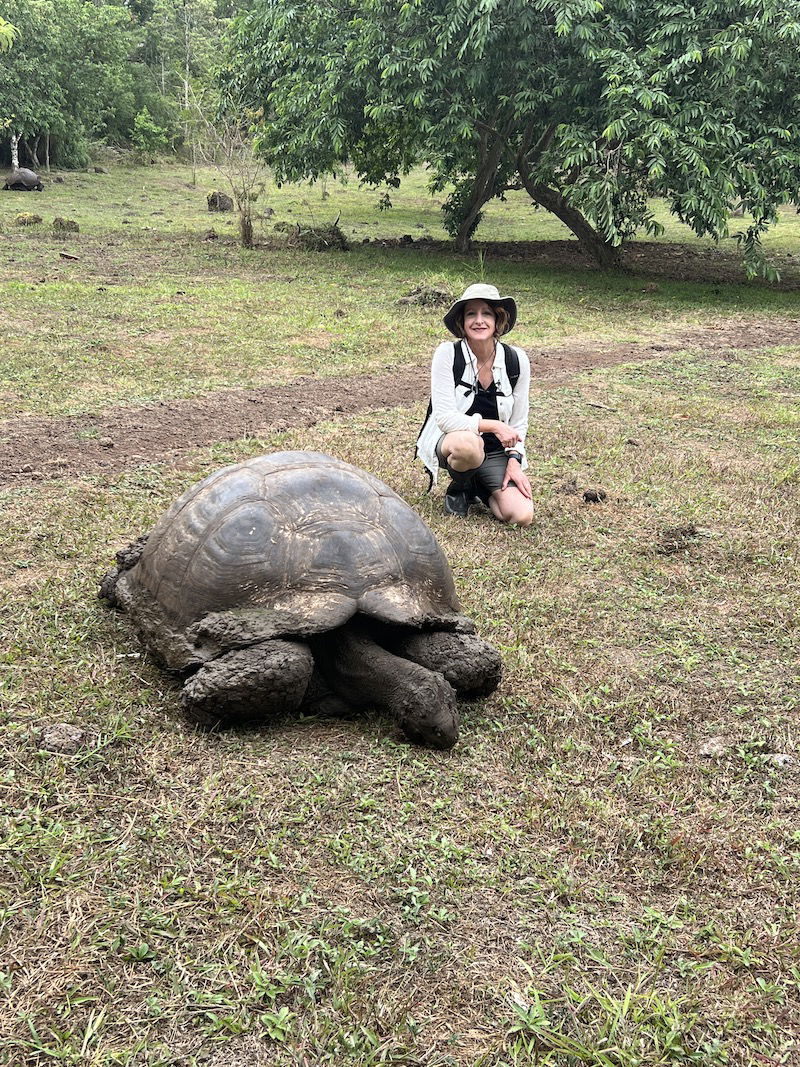 Dr. Rivera next to a tortoise