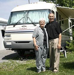 Bob and Jan Thompson with motor home
