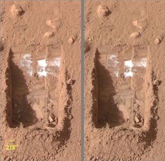 Ice on Mars in trench dug by Phoenix lander (NASA)