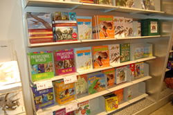 This photograph shows a number of dinosaur books at the Natural History Museum, South Kensington, London