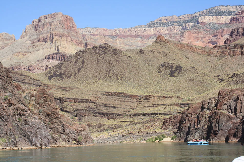 The Bass Rapids diabase sill, the thick, dark, slightly sloping rock layer in the center of the view, has been radioactively “dated” using all four major methods on the same samples, and each method gave a different age, ranging from 841 to 1,379 million years.