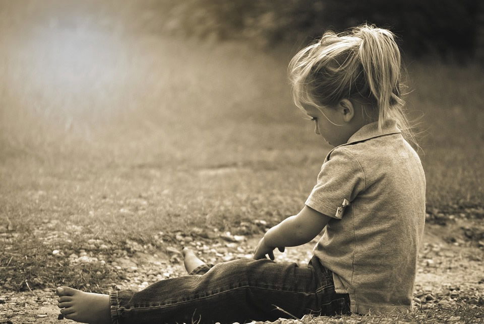 Child Playing in Dirt