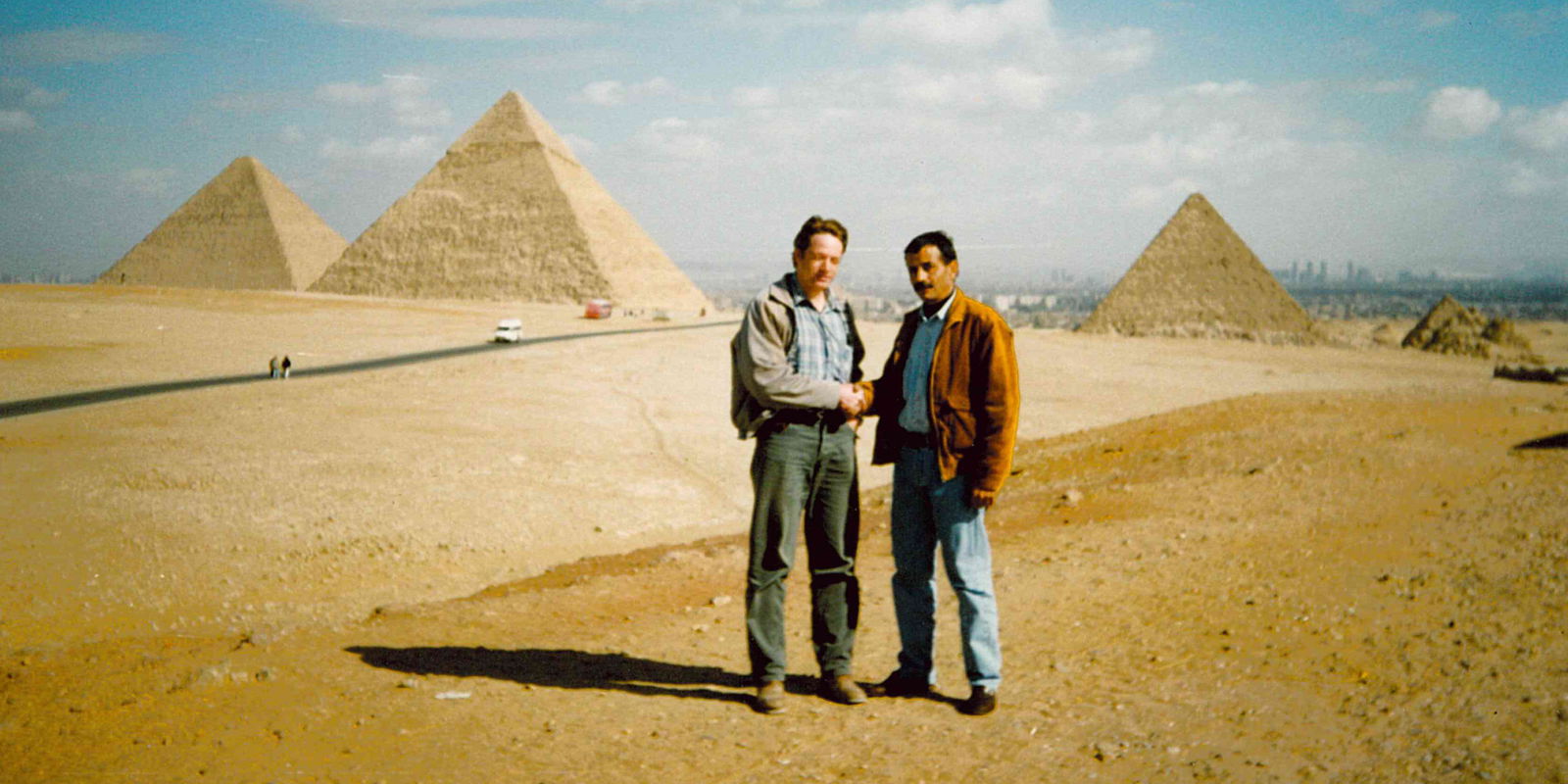 Gavin Cox and colleague by pyramids