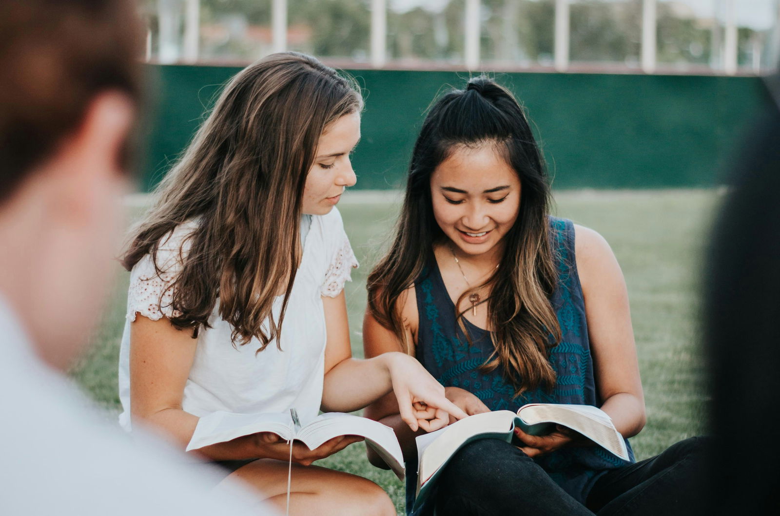 Two women reading the Bible