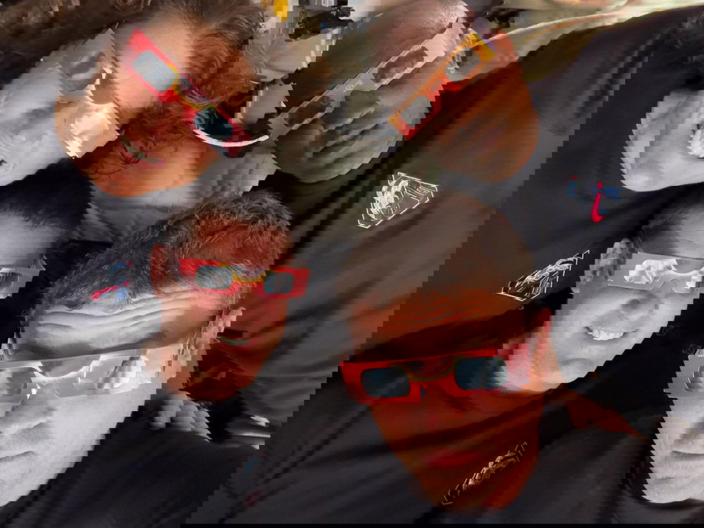 Space crew wearing solar protection glasses