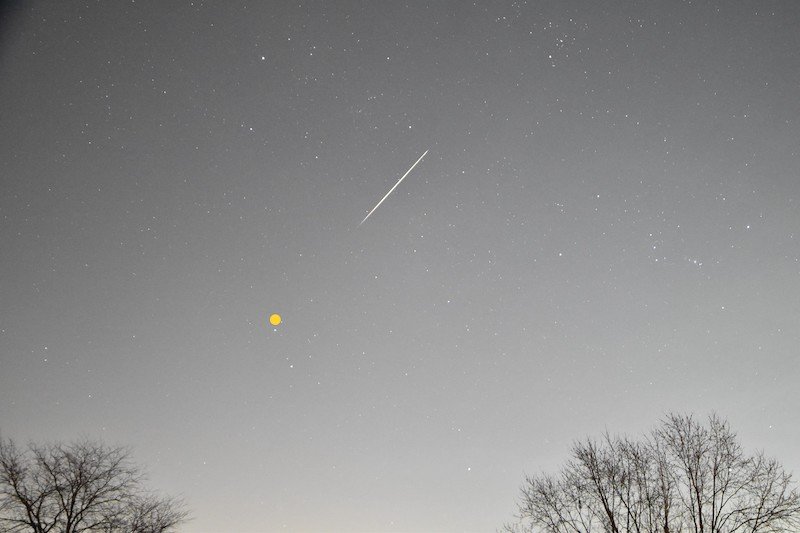 Bright, upward-moving meteor