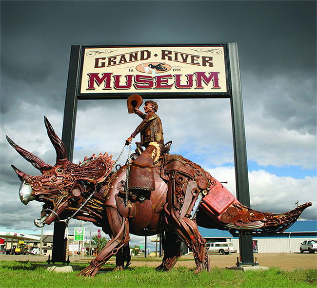 Cowboy Riding Dinosaur