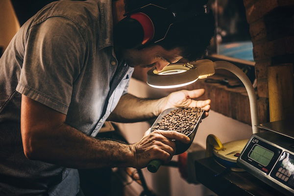 Man with coffee beans