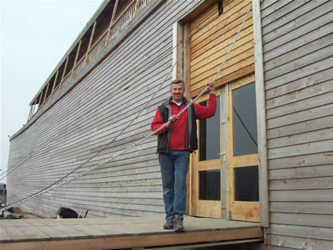 Johan stands outside the side door of the Ark.