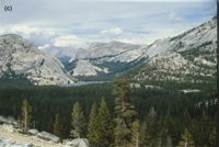 (c) The Tenaya Lake area, looking southwest towards the valley of Tenaya Creek, with towering granite peaks on both sides.