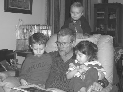 Reading to His Grandchildren