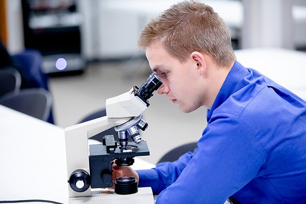 Student with Microscope