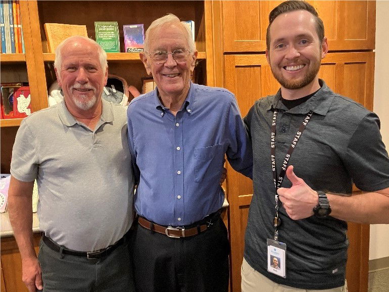 Group photo of Danny Faulkner, Charlie Duke, and Rob Web