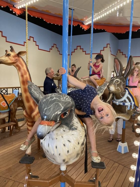 Felicity rides the new carousel at the Ark Encounter