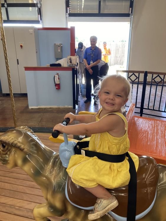 Lois rides the new carousel at the Ark Encounter