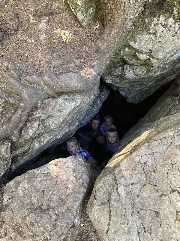 Schu family exploring a cave