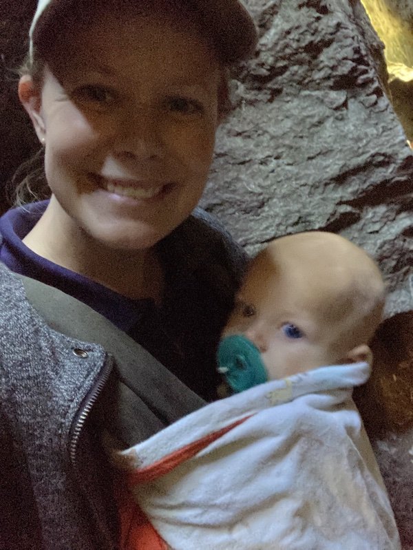 Avery with Gilbert in a cave