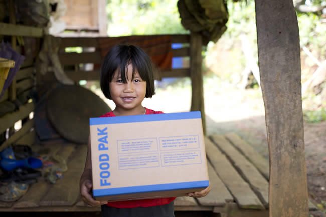 Distributing Food Paks through the Children's Hunger Fund
