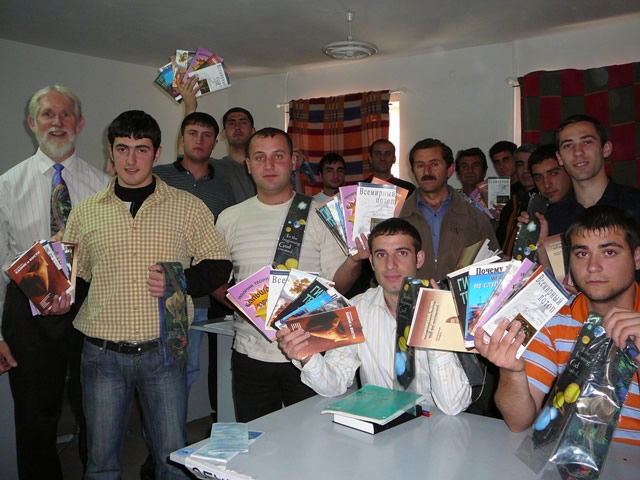 Dr. Joseph Kezele with seminary students in Armenia who received Russian materials from AiG