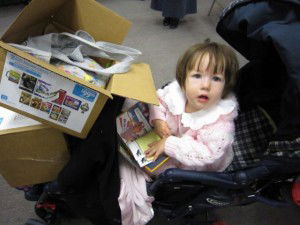 Young child with AiG books