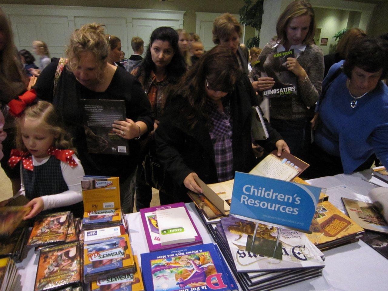 Kids and parents at the resource table