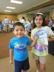 Children with Dinosaur cards