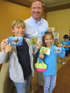 Children with Dinosaur cards