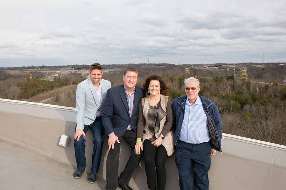 Steve and Donna Gaines on Roof with Ken Ham and Corey Abney