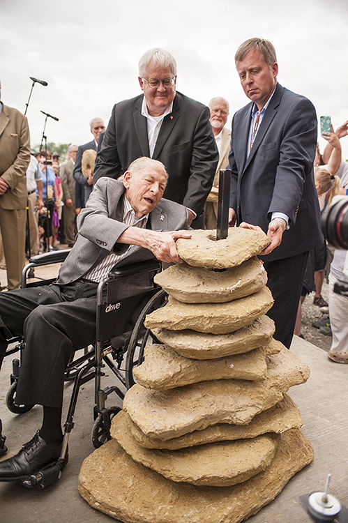 Dr. John Whitcomb Placing Stone