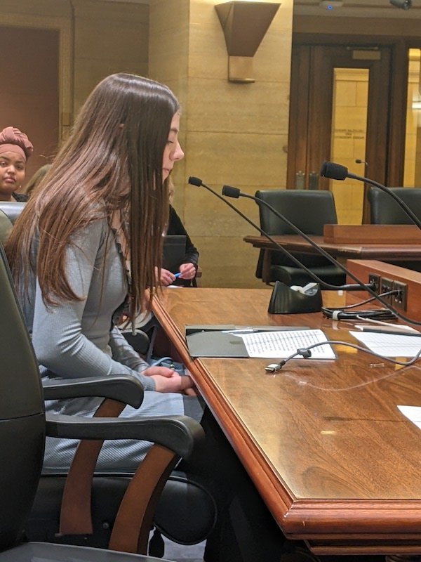 Abby speaking to the Senate Committee