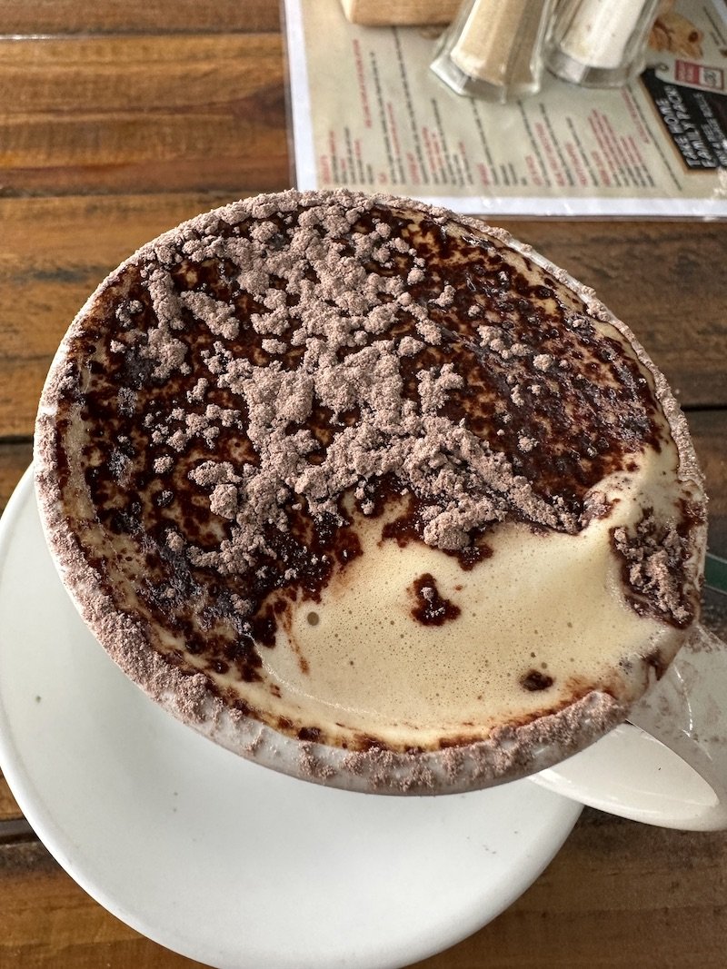 Cappuccino coffee that’s always sprinkled with chocolate