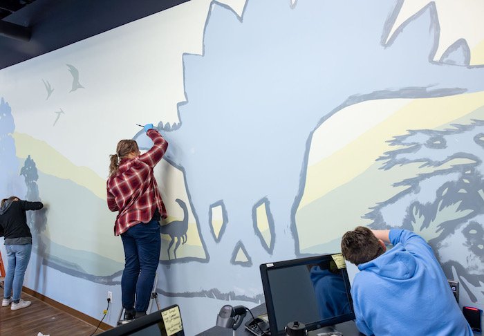 Artists painting new mural in Welcome Center