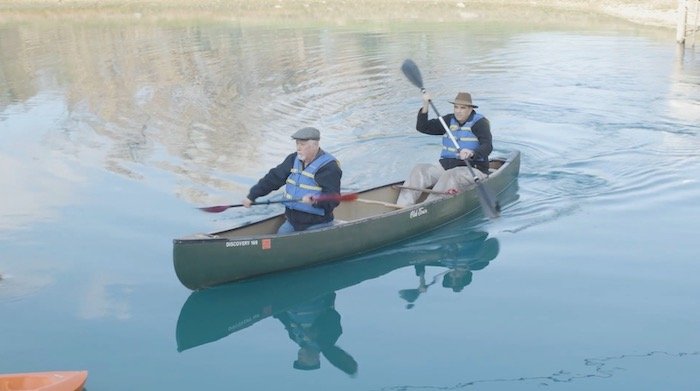 Mr. P and Dr. Danny Faulkner in a boat