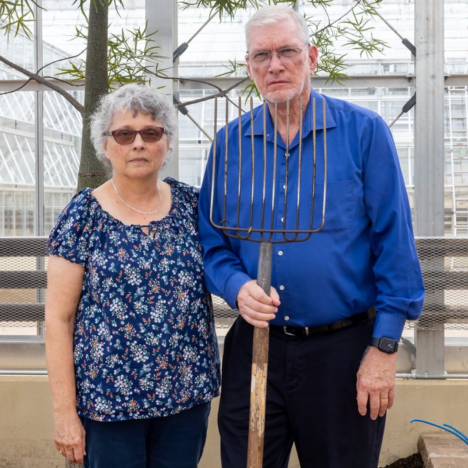 Ken and Mally Ham imitating American Gothic painting