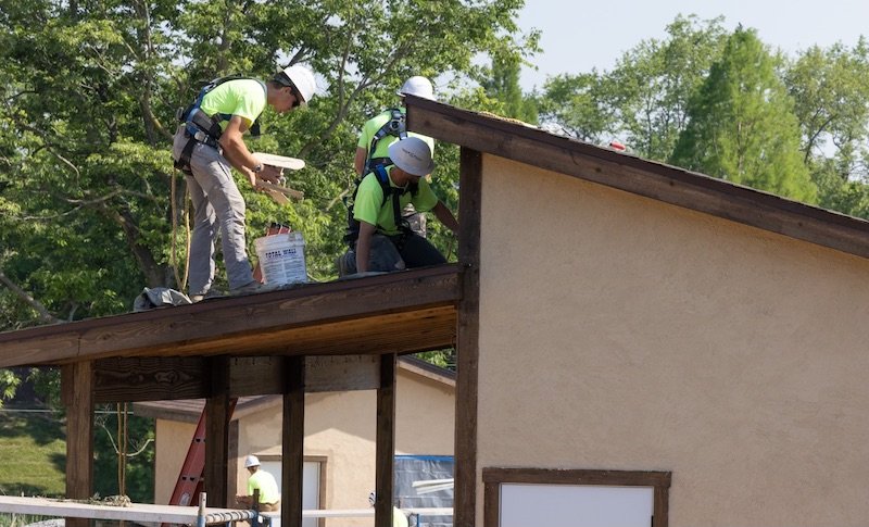 Workers working on a roof