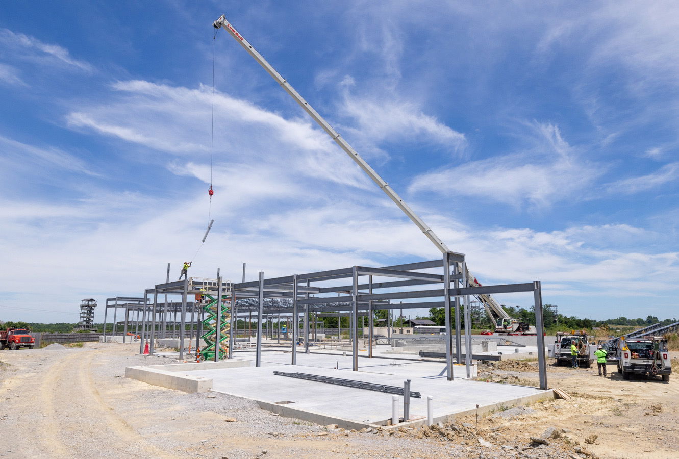 Crane placing beams