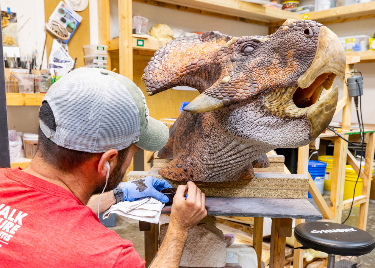 Artist working on Protoceratops