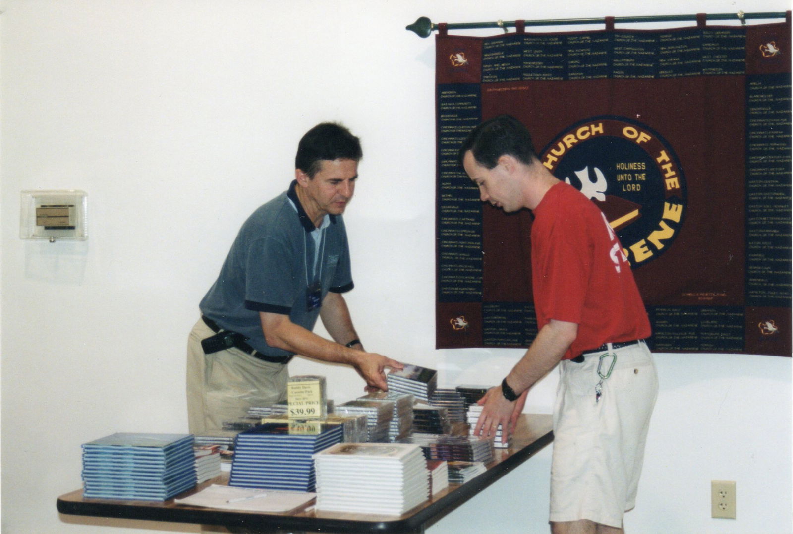 Walt arranging book table