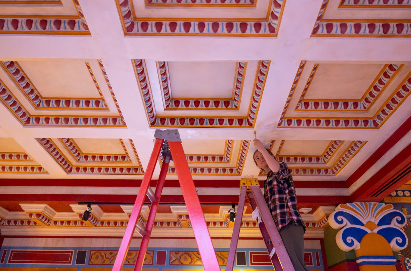 Artist painting ceiling