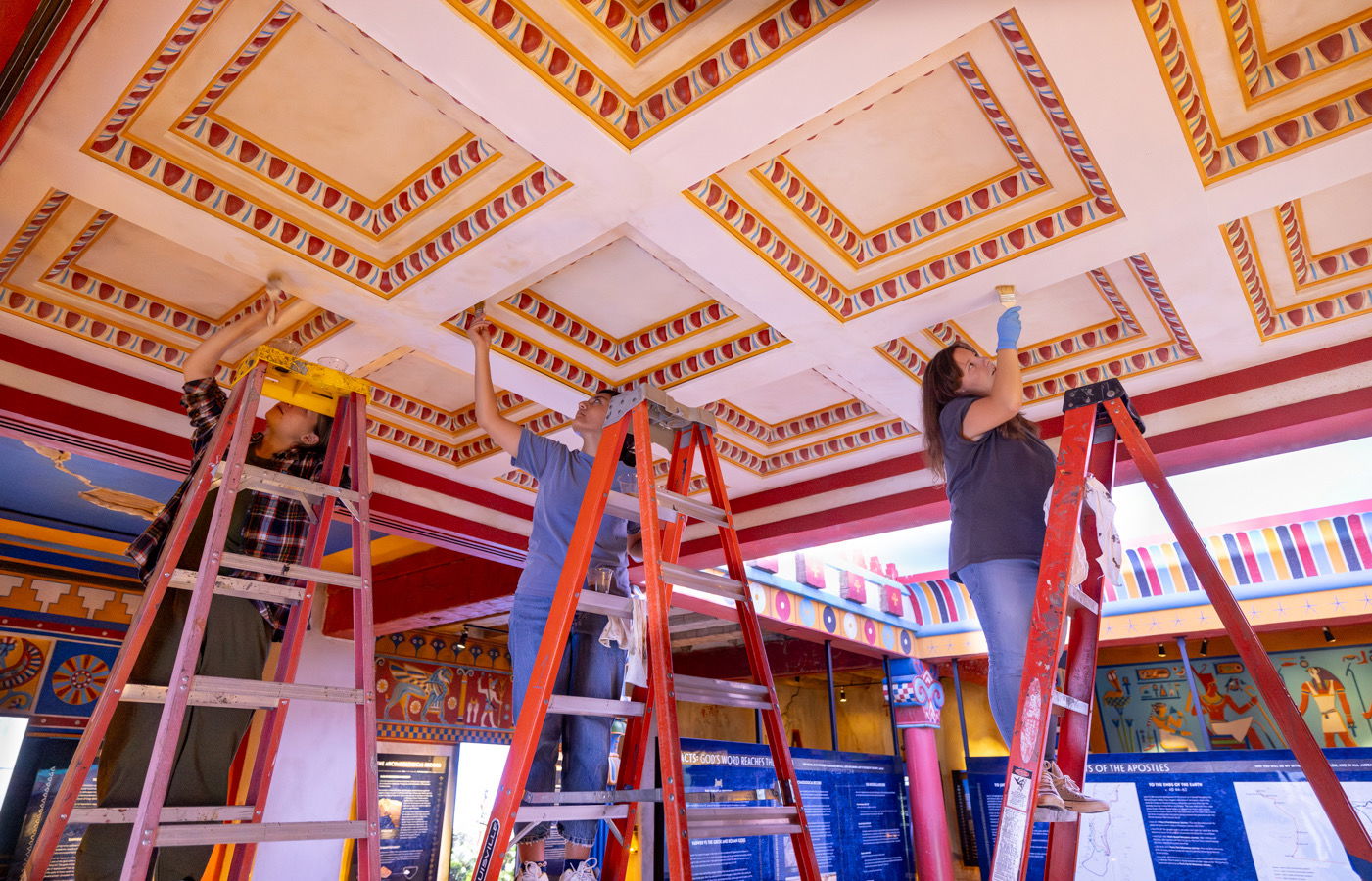 Artists painting ceiling