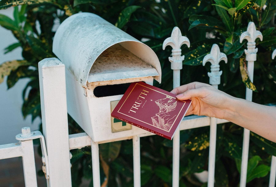 Gospel being put in mailbox