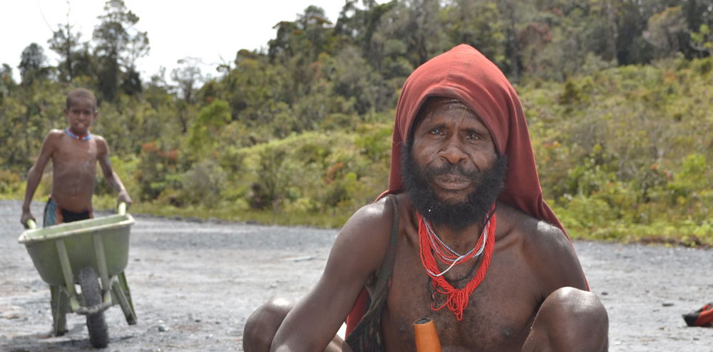 Man with String Necklaces