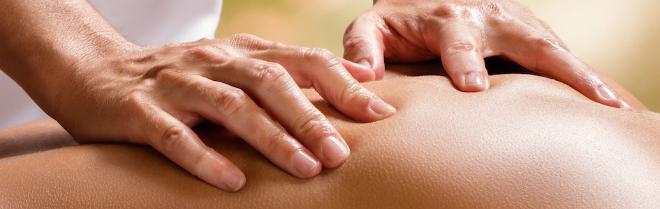 Hand massaging back
