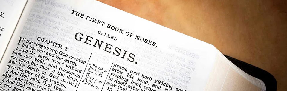 Bible open to Genesis