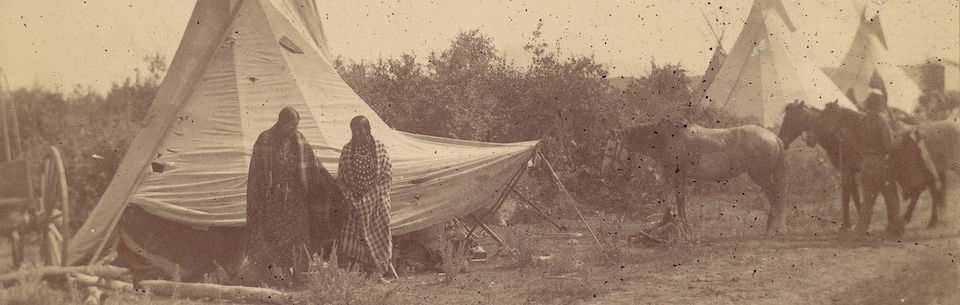 Indigenous women at teepee camp
