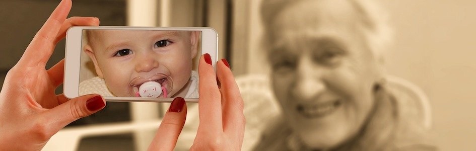 Taking a cell phone picture of an old woman, but the photo shows a young child