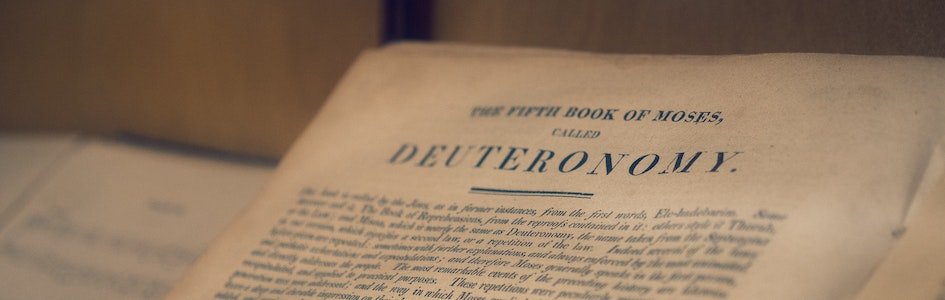 Bible open to the book of Deuteronomy