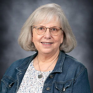 Suellen Button
