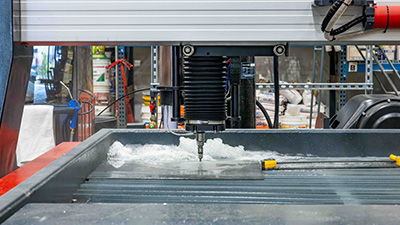 Construction Update: New “Waterjet” Cuts Metal for Jerusalem Model