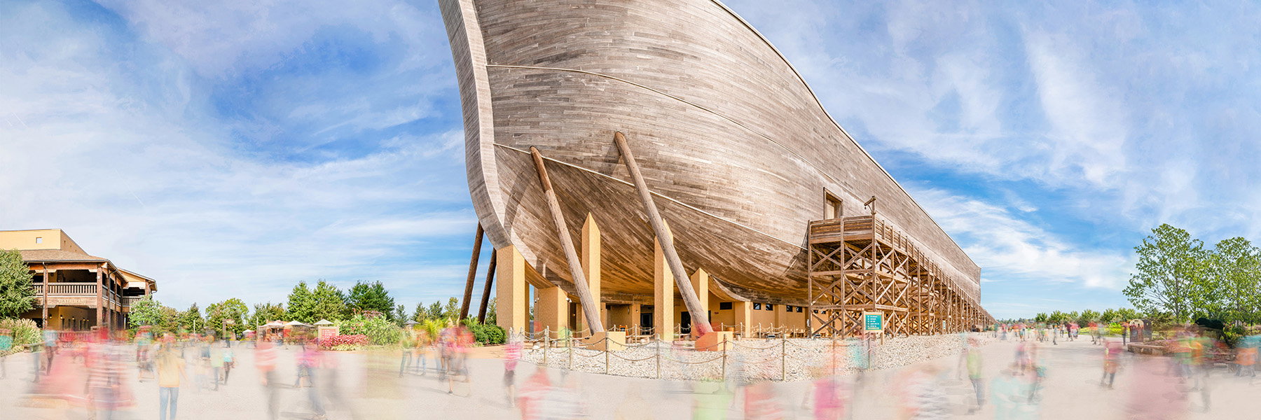 Guests walking toward the Ark Encounter, a full-size wooden Noah's Ark